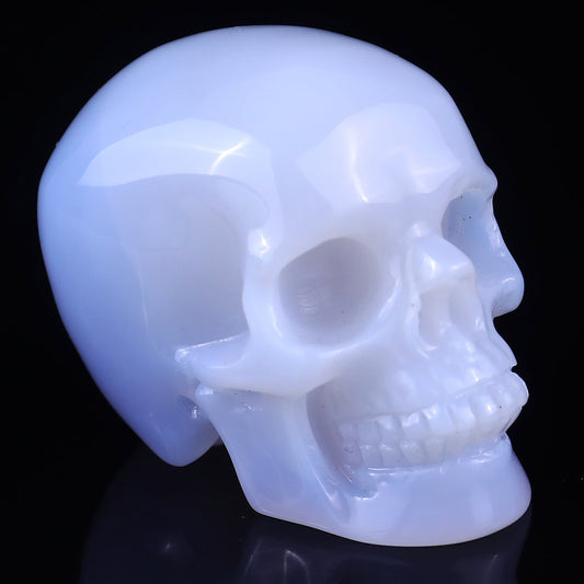 Kindred Vein 2.2" Blue Chalcedony Hand Carved Crystal Realistic Skull Sculpture (SKU: 2100019) - Photo 1