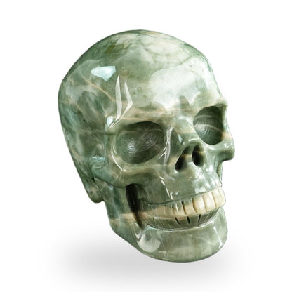 Kindred Vein 3" Nine Dragon Jade Hand Carved Crystal Realistic Skull Sculpture (SKU: SKH30HA01) - Photo 3